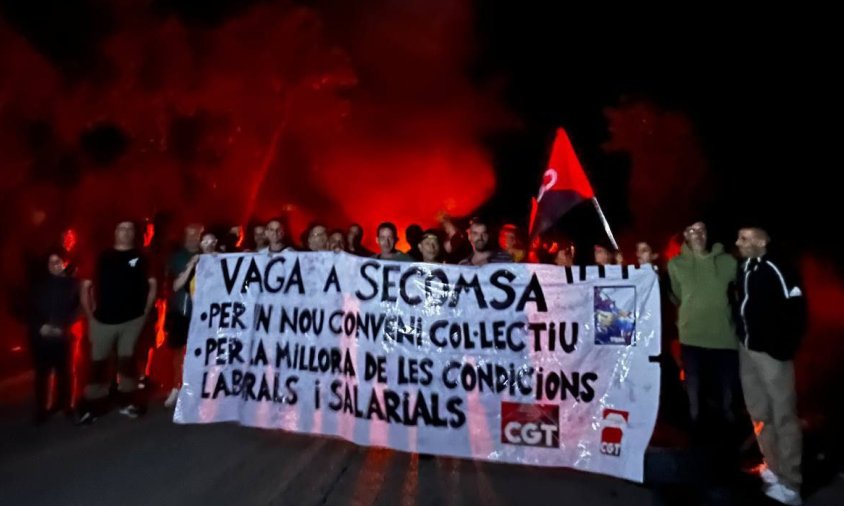 Pancarta de protesta del treballadors de Secomsa